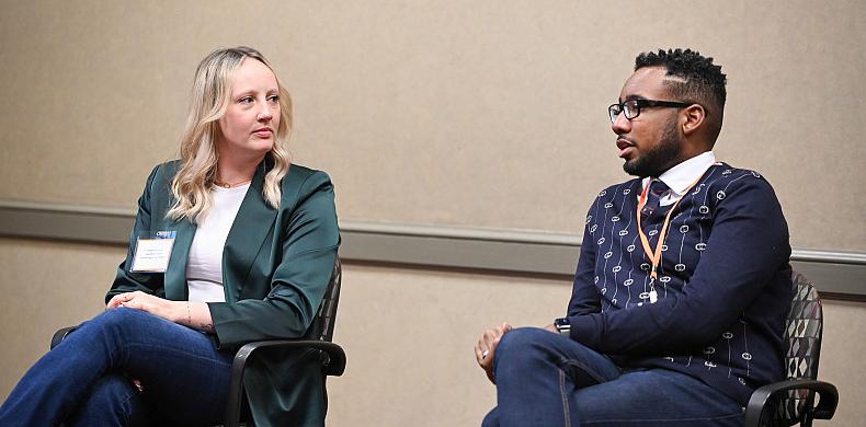 Two alumni discuss networking as part of a Break Through panel.